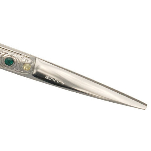 Beauty shears with a convex edge